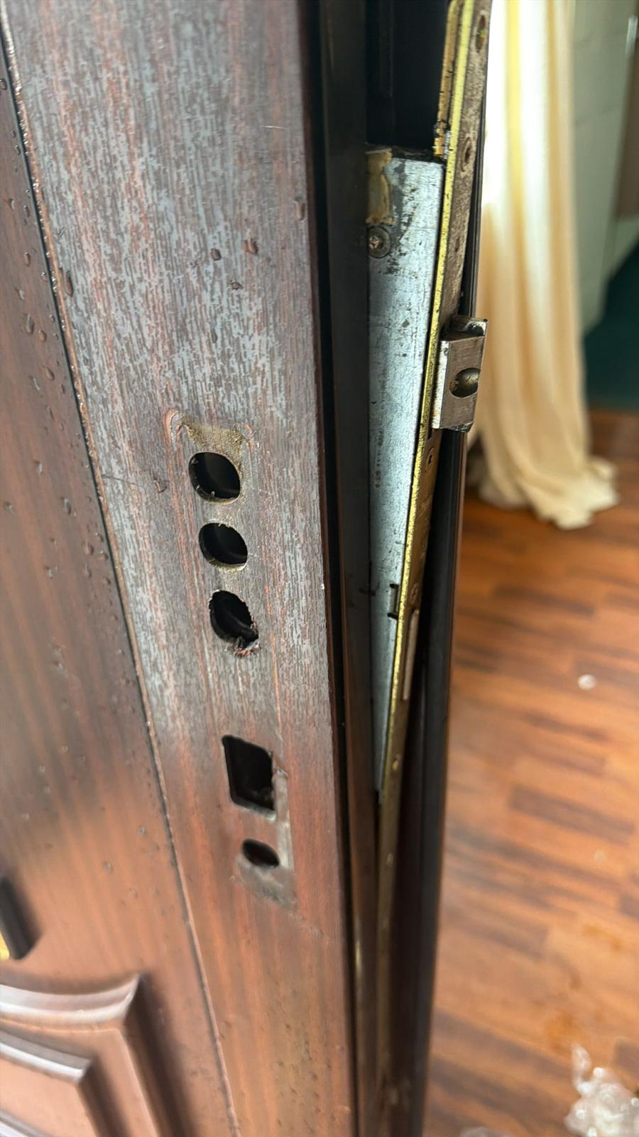 Mortice lock holes prepared on a door edge